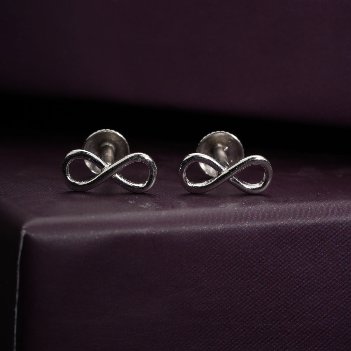Infinity silver studs