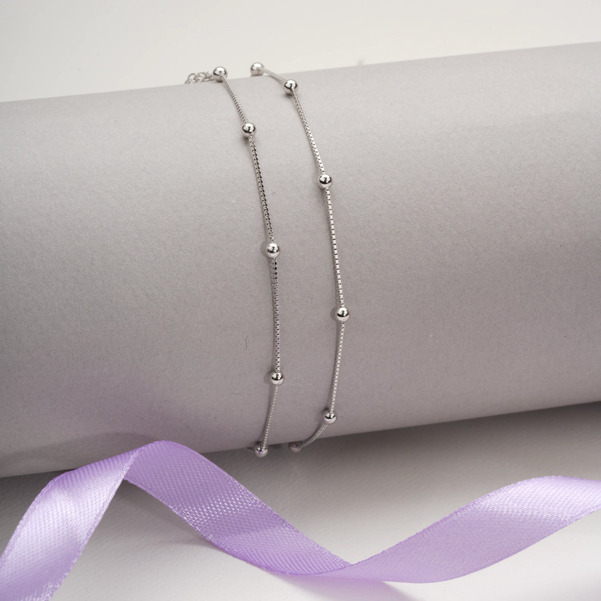 Shimmering bead anklets (set of 2)